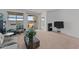 Comfortable living room with natural light and access to the backyard patio at 13171 W Buckskin Trl, Peoria, AZ 85383