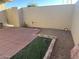 Enclosed backyard featuring brick-paved patio area, and potential for personalized landscaping at 13801 N 111Th Ave, Sun City, AZ 85351