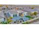 Aerial view of the home's landscaped backyard, featuring a fire pit and outdoor living spaces at 14562 W Georgia Ave, Litchfield Park, AZ 85340