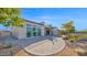 Stunning backyard showcasing a spiral staircase and a well-manicured, landscaped oasis at 14562 W Georgia Ave, Litchfield Park, AZ 85340