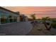 Backyard featuring pavers, landscaping, spiral staircase, and a modern design at 14562 W Georgia Ave, Litchfield Park, AZ 85340