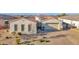 Charming home featuring a tile roof, neutral stucco, and well-maintained desert landscaping at 14562 W Georgia Ave, Litchfield Park, AZ 85340