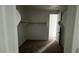 This walk-in closet has shelving and a rod for clothes hanging at 15769 W Cheryl Dr, Waddell, AZ 85355