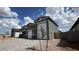 Single Gathering home with a spacious two car garage, desert landscaping, and brick driveway at 15769 W Cheryl Dr, Waddell, AZ 85355