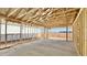 A room inside of a home under construction, showing the framing of the large sliding glass doors at 15769 W Cheryl Dr, Waddell, AZ 85355