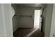 Walk-in closet with shelving provides ample storage space at 15769 W Cheryl Dr, Waddell, AZ 85355