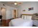 Well lit bedroom featuring adjacent bathroom and neutral decor at 1701 E Colter St # 10, Phoenix, AZ 85016