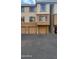 Attractive townhome-style condominiums with well-maintained garages and neutral color scheme at 1701 E Colter St # 10, Phoenix, AZ 85016