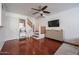 Bright living room with hardwood floors, modern ceiling fan and stylish furnishings at 1701 E Colter St # 10, Phoenix, AZ 85016