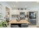 Modern kitchen with white cabinets, woodblock countertops, and stainless steel appliances at 1926 W Holly St, Phoenix, AZ 85009