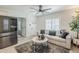 Bright and modern living room with a comfortable sofa, contemporary decor, and plenty of natural light at 1926 W Holly St, Phoenix, AZ 85009