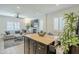 Spacious living area offering views of the living room and kitchen areas at 1926 W Holly St, Phoenix, AZ 85009