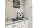 Practical laundry room with a sink, storage, and a sleek design, making laundry tasks easier at 20729 E Canary Way, Queen Creek, AZ 85142