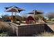 Community playground for residents with shaded areas and a variety of equipment for children to enjoy at 20729 E Canary Way, Queen Creek, AZ 85142