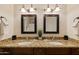 Double vanity bathroom featuring granite countertops, modern fixtures, and ample lighting at 21630 N 30Th Ln, Phoenix, AZ 85027