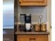 Kitchen featuring countertop with Keurig coffee maker and wooden coffee pod holders at 21630 N 30Th Ln, Phoenix, AZ 85027