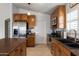 Well-equipped kitchen featuring modern appliances, ample cabinet space, and tile flooring at 21630 N 30Th Ln, Phoenix, AZ 85027