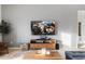 Comfortable living room featuring modern furniture, a television, and decor at 21630 N 30Th Ln, Phoenix, AZ 85027