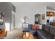 Inviting living room featuring stylish furniture and a view into other rooms at 21630 N 30Th Ln, Phoenix, AZ 85027