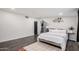 Inviting bedroom with a comfortable bed, modern decor, hardwood floors and a stylish rug at 2324 N 40Th St, Phoenix, AZ 85008