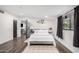 Charming bedroom with a cozy bed, hardwood floors, and plenty of natural light at 2324 N 40Th St, Phoenix, AZ 85008