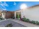 Close up of charming single-story home featuring desert landscaping and a bright green front door at 2324 N 40Th St, Phoenix, AZ 85008