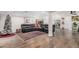 Expansive living room features sectional sofa, wood floors, and an open layout at 2324 N 40Th St, Phoenix, AZ 85008