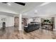 Open living area features wood flooring, stone fireplace, and spacious layout at 2324 N 40Th St, Phoenix, AZ 85008