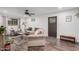 Cozy living room featuring wood floors, neutral furniture, and ample natural light at 2324 N 40Th St, Phoenix, AZ 85008