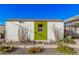 Exterior storage shed with olive-green door and stone landscaping at 2324 N 40Th St, Phoenix, AZ 85008
