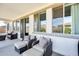 Cozy patio with comfortable seating, and ample space for entertaining and relaxing outdoors at 24441 N 142Nd Dr, Surprise, AZ 85387