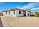View of house and backyard featuring a covered patio, with open space ready for your landscape design at 24441 N 142Nd Dr, Surprise, AZ 85387