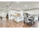 Modern kitchen featuring white cabinetry, stainless appliances and a center island with beautiful granite countertops at 24441 N 142Nd Dr, Surprise, AZ 85387