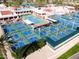 Aerial view of community pickleball courts surrounded by landscaping and recreational facilities at 25261 S Berry Brook Dr, Sun Lakes, AZ 85248