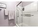 Modern shower with glass door and safety grab bar at 25261 S Berry Brook Dr, Sun Lakes, AZ 85248