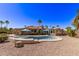 Home's backyard featuring a sparkling pool, and covered patio, perfect for outdoor entertaining at 26245 S Glenburn Dr, Sun Lakes, AZ 85248