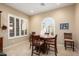 Bright dining area featuring neutral walls and shutters that offer privacy and control natural light at 26249 W Abraham Ln, Buckeye, AZ 85396