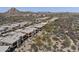 An aerial of luxury desert homes featuring mountain views, modern architecture and desert landscaping at 27000 N Alma School Pkwy # 1024, Scottsdale, AZ 85262
