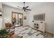 Cozy living room with a sliding door to outdoor seating, neutral tones, and stylish furnishings at 27000 N Alma School Pkwy # 1024, Scottsdale, AZ 85262