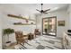 Comfortable living room with stylish decor, slider to outdoor seating, and great natural light at 27000 N Alma School Pkwy # 1024, Scottsdale, AZ 85262