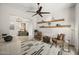 Open living area showcasing stylish decor, accent shelving, and seamless flow to other living spaces at 27000 N Alma School Pkwy # 1024, Scottsdale, AZ 85262