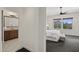 A glimpse into the spacious bedroom with en-suite bathroom at 27000 N Alma School Pkwy # 1024, Scottsdale, AZ 85262