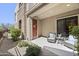 Relaxing patio with desert landscaping and comfortable seating, perfect for enjoying outdoor living at 27000 N Alma School Pkwy # 1024, Scottsdale, AZ 85262