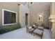 Private outdoor patio with comfortable seating, manicured landscaping, and serene ambiance at 27000 N Alma School Pkwy # 1024, Scottsdale, AZ 85262