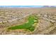 Panoramic aerial view of the community adjacent to the golf course and natural desert landscape at 3138 W Ravina Ln, Anthem, AZ 85086