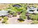 Aerial view of community with green roofs and desert landscaping at 3138 W Ravina Ln, Anthem, AZ 85086