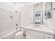 Bright bathroom with a shower-tub combo and modern fixtures at 3138 W Ravina Ln, Anthem, AZ 85086