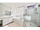 Modern bathroom features a walk-in shower with glass enclosure and a soaking tub at 3138 W Ravina Ln, Anthem, AZ 85086