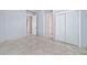 Bedroom with tile flooring, closet, and an attached room at 3138 W Ravina Ln, Anthem, AZ 85086