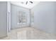 Tile bedroom with large windows and a closet at 3138 W Ravina Ln, Anthem, AZ 85086